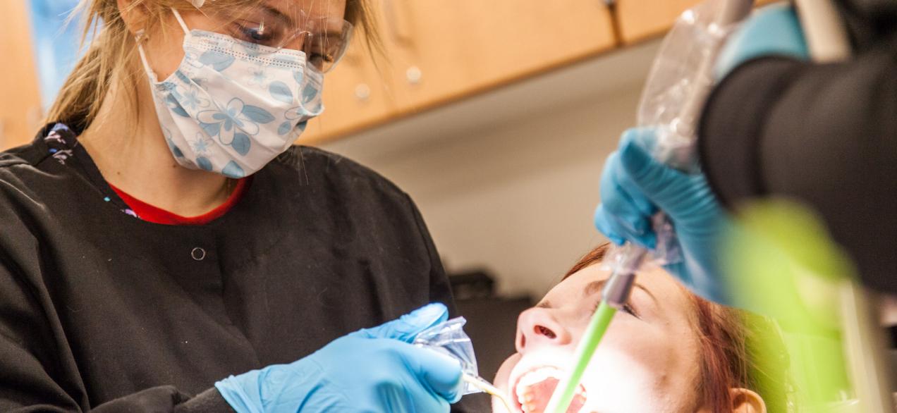 person getting teeth cleaned